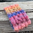 Hand knitted, lined headband featuring Celtic knot pattern 