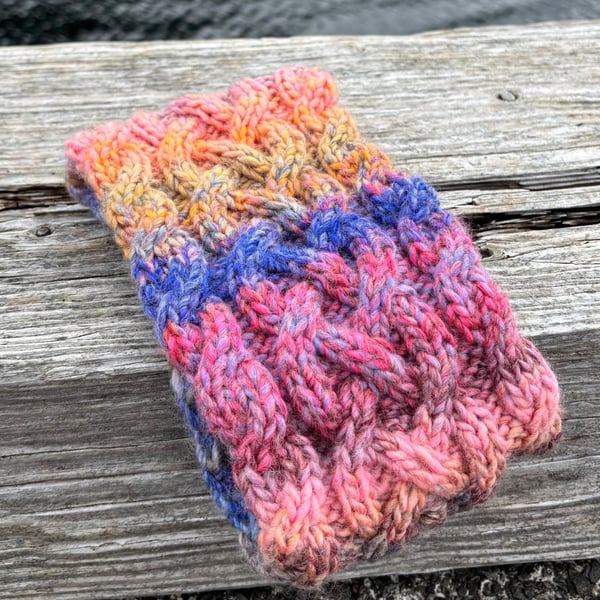 Hand knitted, lined headband featuring Celtic knot pattern 