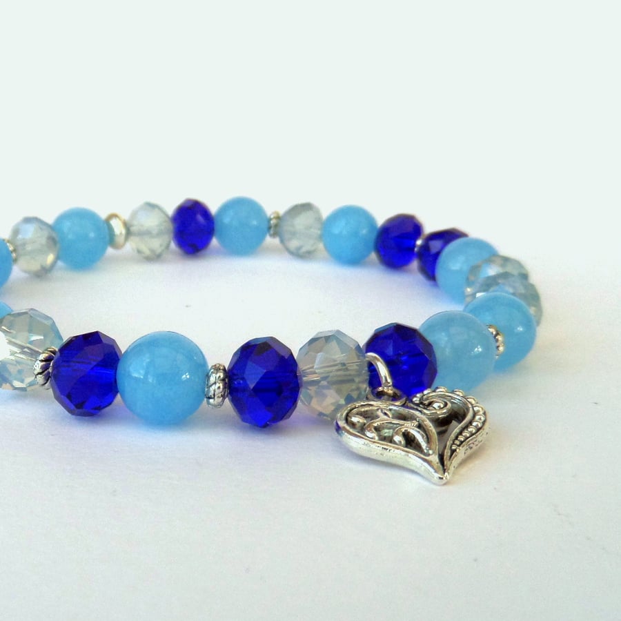 Blue gemstone and crystal stretchy bracelet with heart charm