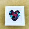 Cast glass heart in a box frame 