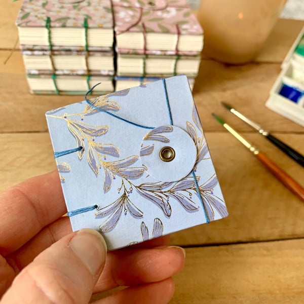 Coptic Bound Tiny Floral Watercolour Sketchbook. Blue and gold.