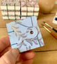 Coptic Bound Tiny Floral Watercolour Sketchbook. Blue and gold.