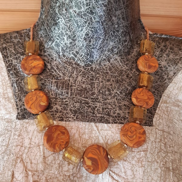 Burnt orange and brown disc shaped necklace