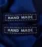 Woven “Hand Made” craft label dark blue