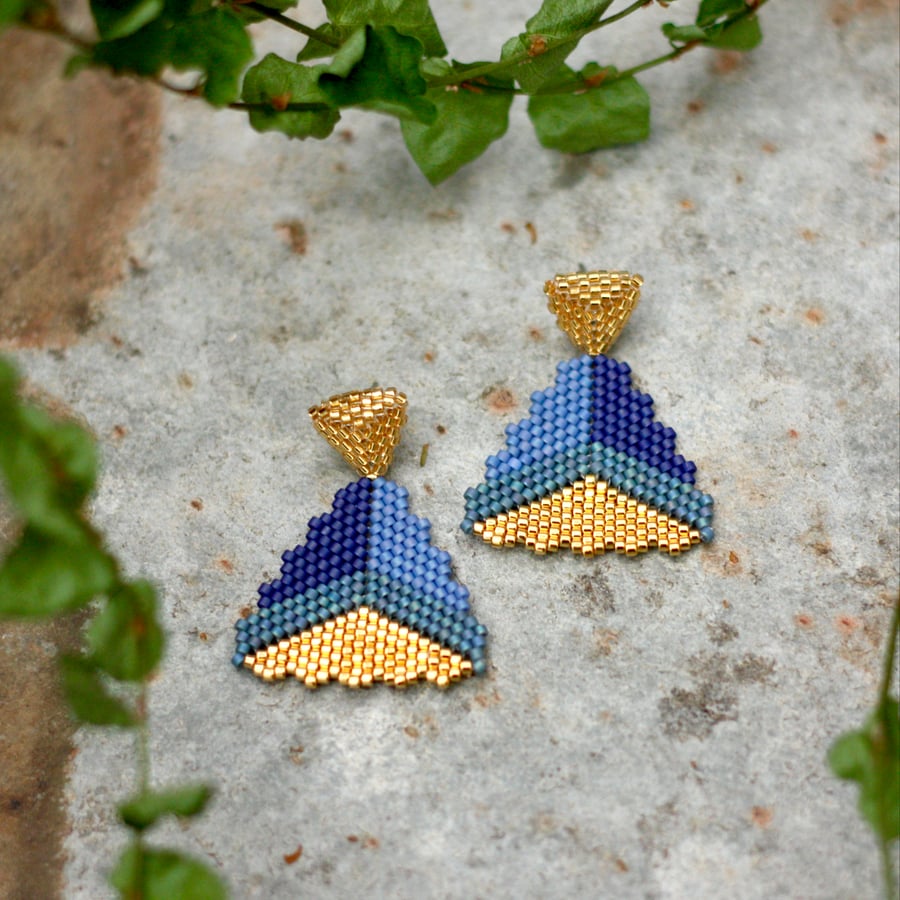 Blue and gold handmade beaded earrings.