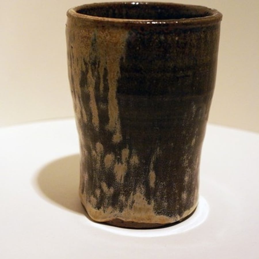 The watering hole - Brown and cream hand thrown half pint beaker cup