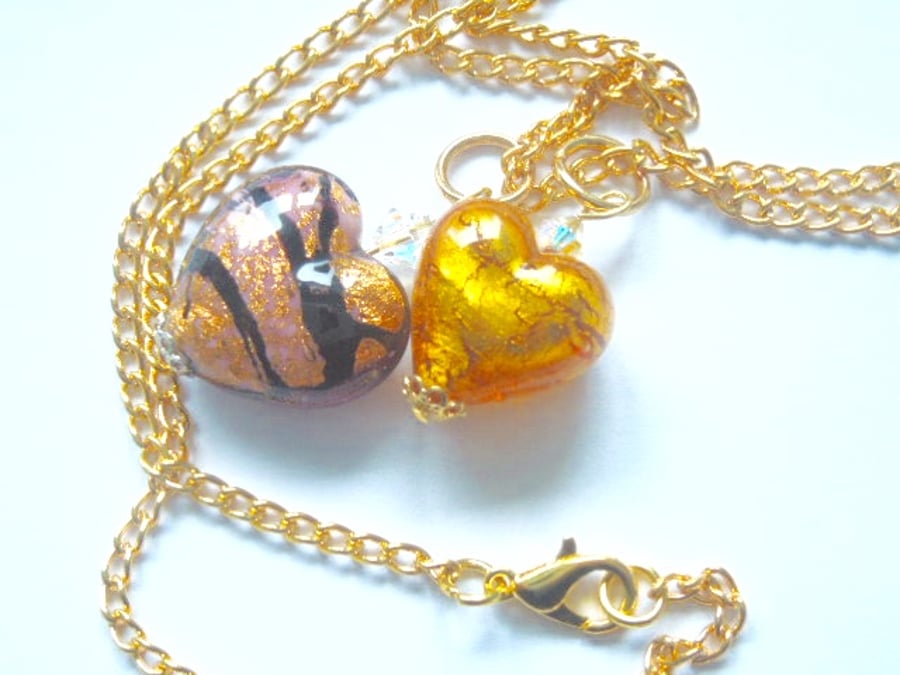 Murano glass gold double heart pendant with Swarovski crystal.