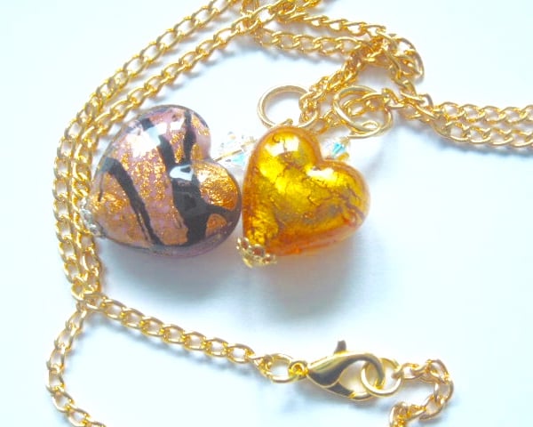 Murano glass gold double heart pendant with Swarovski crystal.