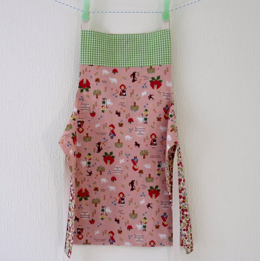 Girls Apron,  Reversible: Red Riding Hood and Strawberries