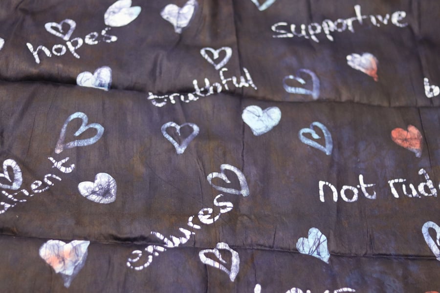 Love attributes African adire batik hand printed shapes in colours fabric