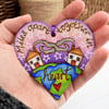 Miles apart, togther in heart. Pyrography hanging heart decoration with colour. 