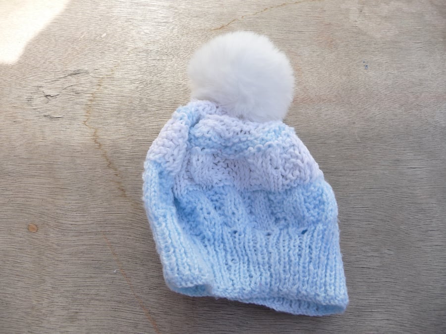Bobble hat blue and white striped yarn faux fur pompom baby accessories.