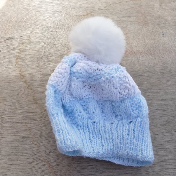 Bobble hat blue and white striped yarn faux fur pompom baby accessories.