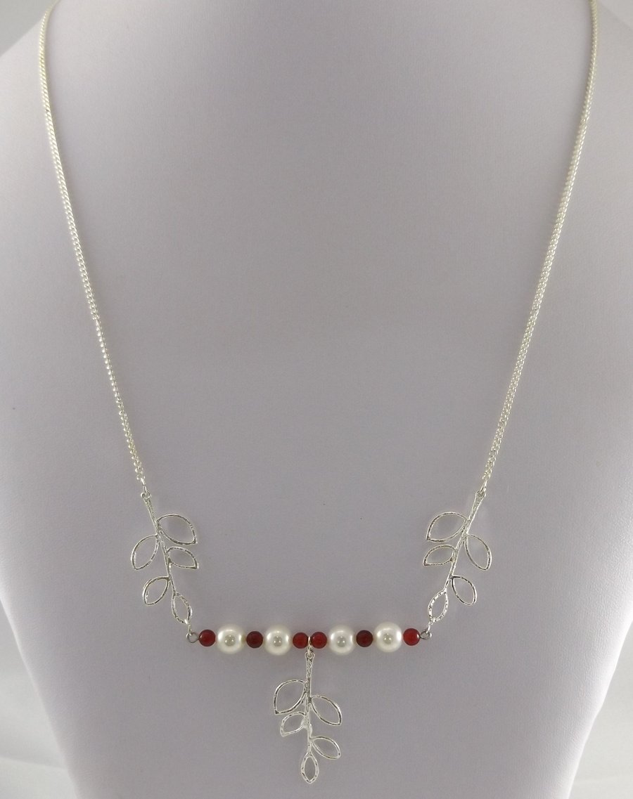 White shell pearl necklace with silver leaf charms 24"
