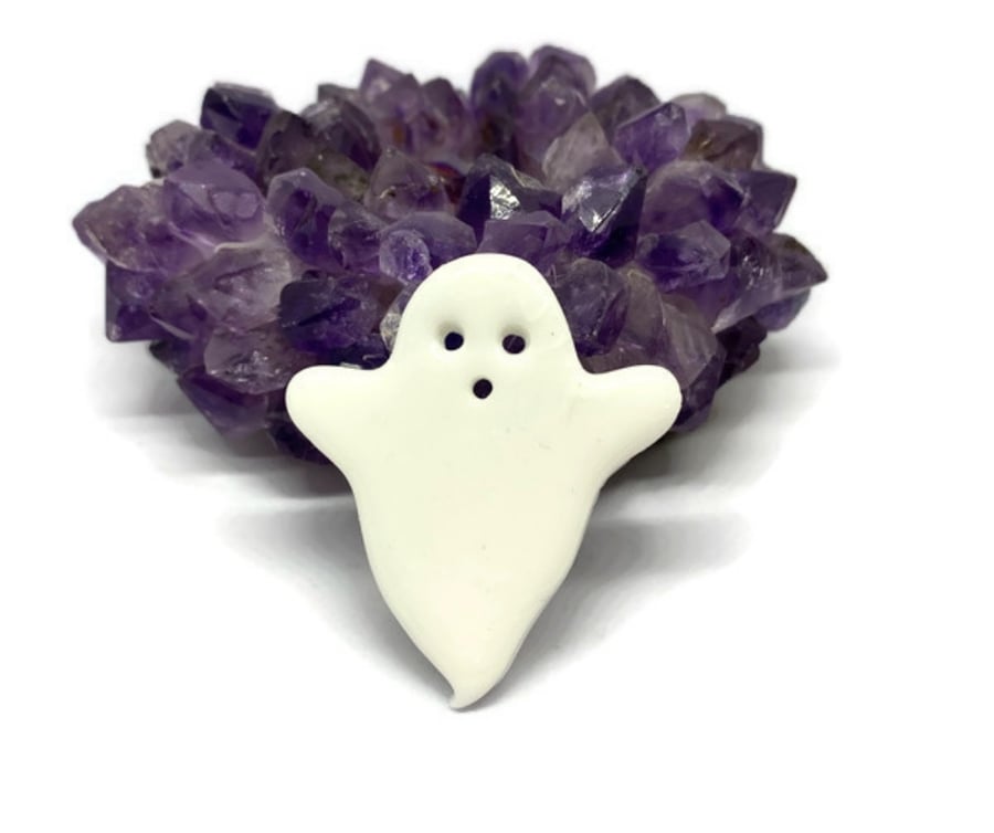 White ghost statement brooch with clasp.