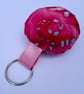 Pink floral circular keyring 