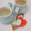 Two valentine mugs, beach