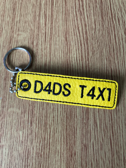 1108. D4DS T4X1 number plate keyring.