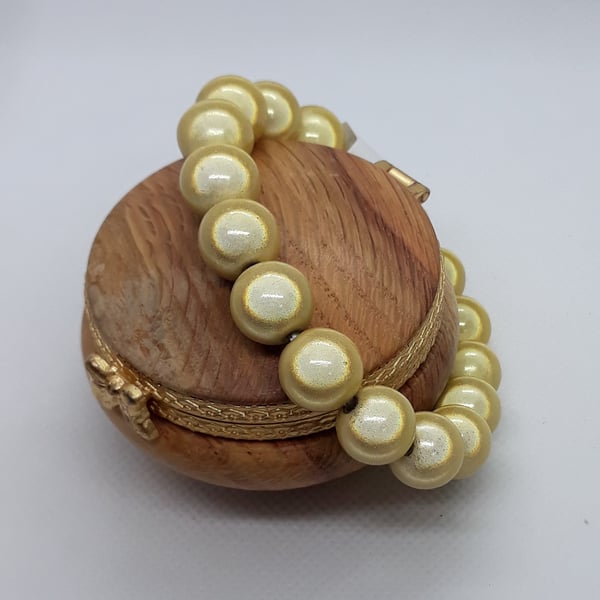 BR359 Pale yellow miracle bead bracelet