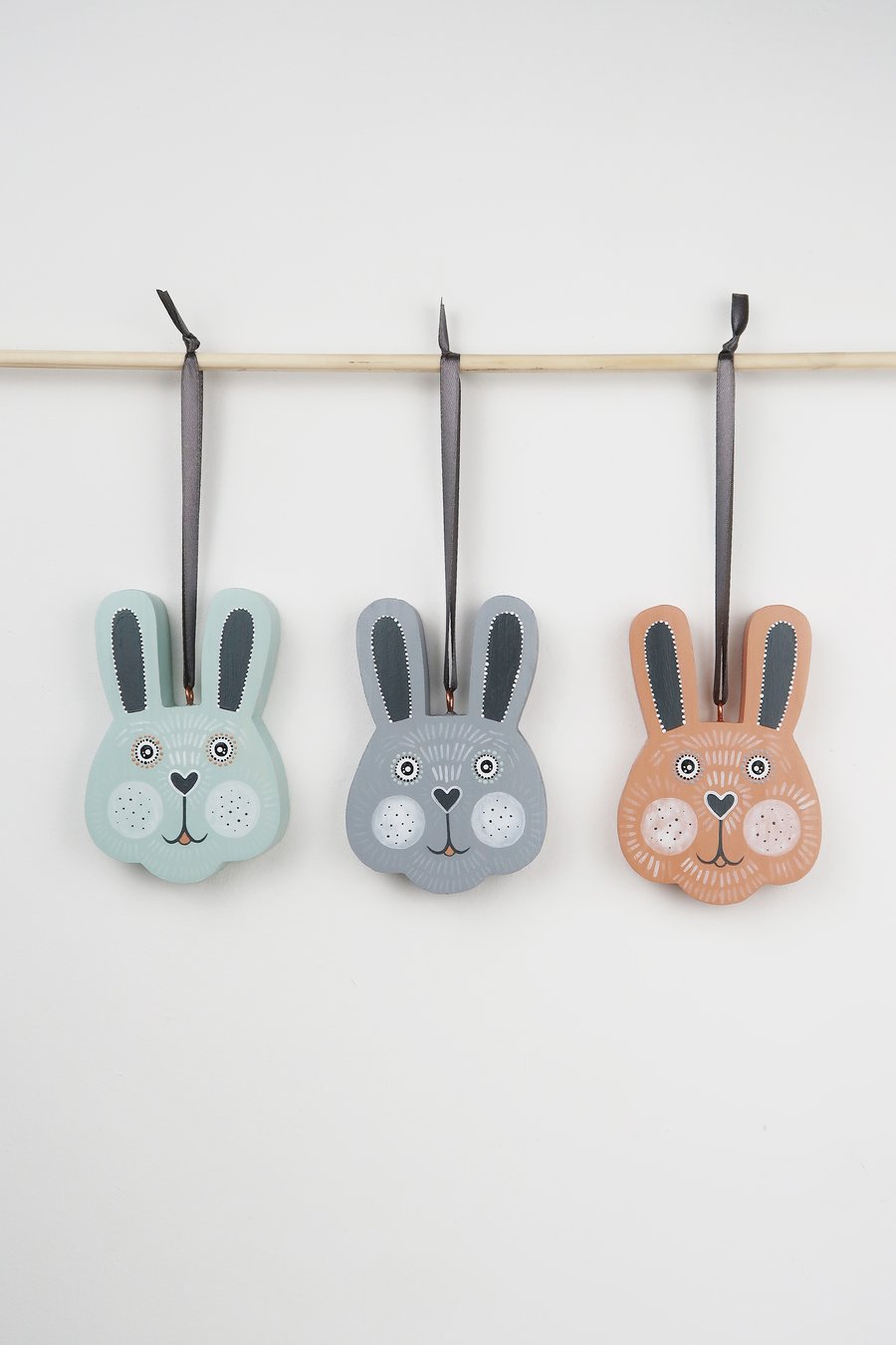 easter bunny hanging decorations, pastel wooden hares, cute spring decor