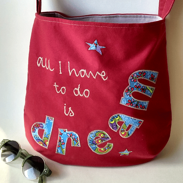 Red ‘Dream’ crossbody bag with adjustable strap