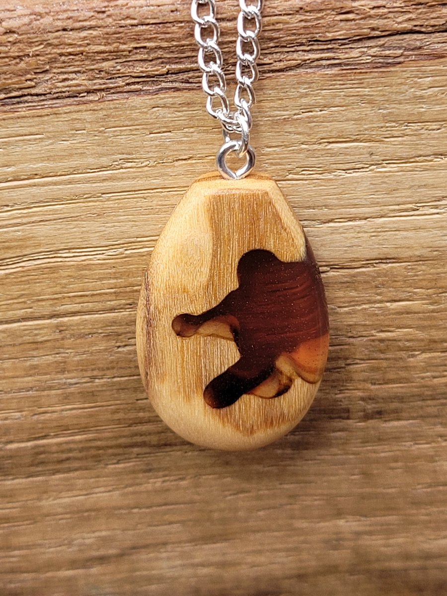Olive wood and pale red resin pendant - free UK postage