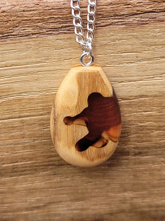 Olive wood and pale red resin pendant - free UK postage