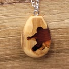 Olive wood and pale red resin pendant - free UK postage