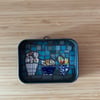 Mini mosaic in tobacco tin