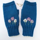 Fingerless gloves knitted in wool with pink and cream embroidered daisy flowers