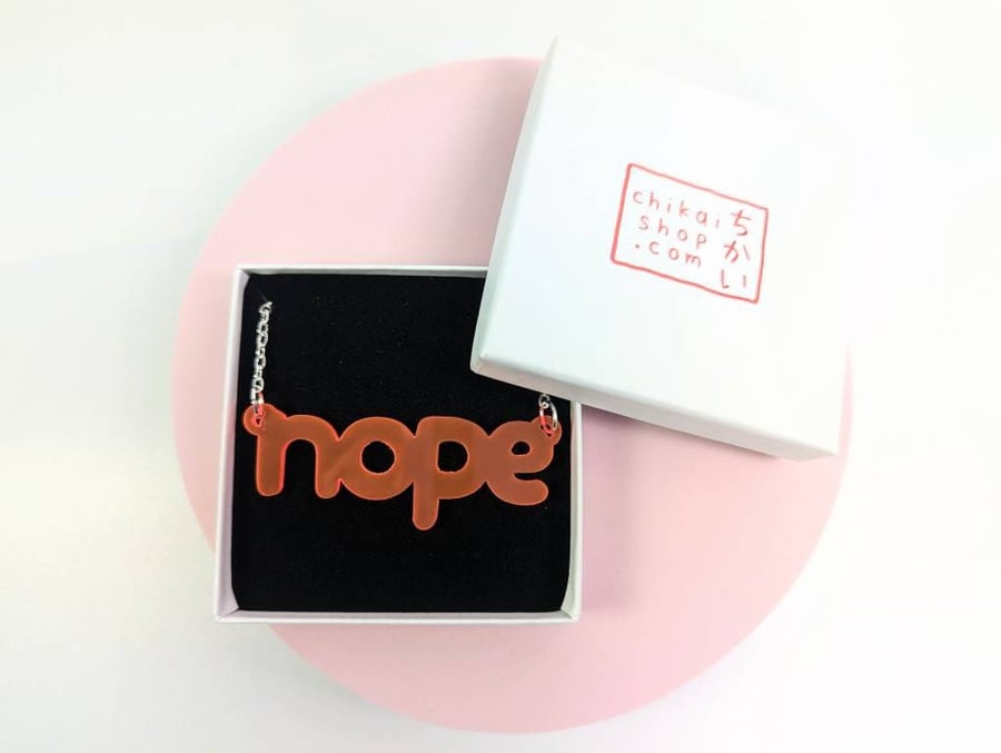 Nope necklace on neon pink translucent acrylic with silver plated chain