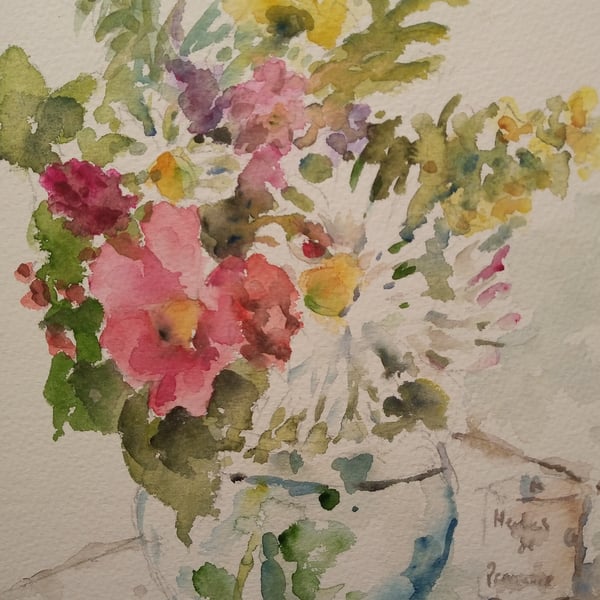 Garden flowers in a glass bowl 