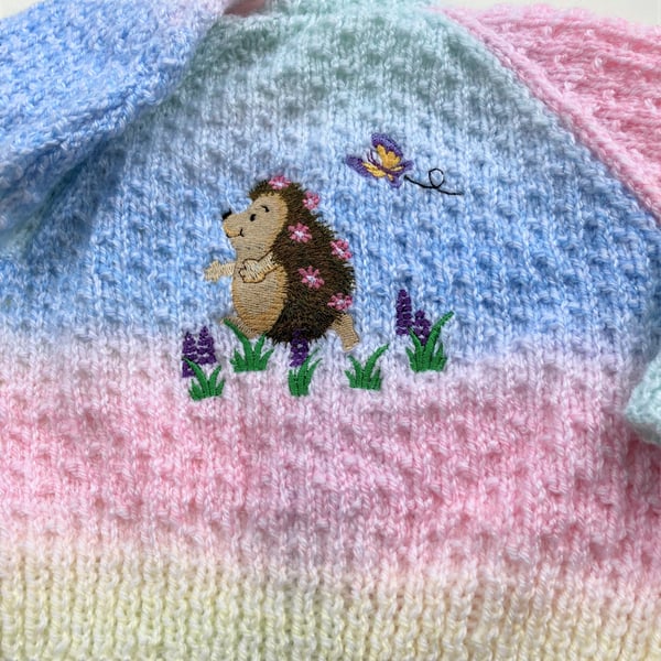 Hand knitted Girl's Pastel Baby cardigan to fit 6 - 12 months with Hedgehog