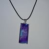 Handmade purple pendant on black waxed cord