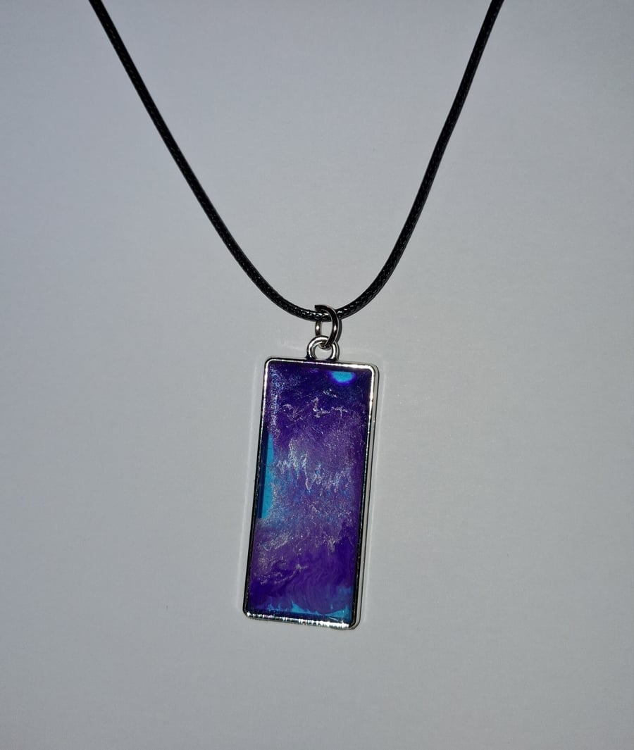 Handmade purple pendant on black waxed cord