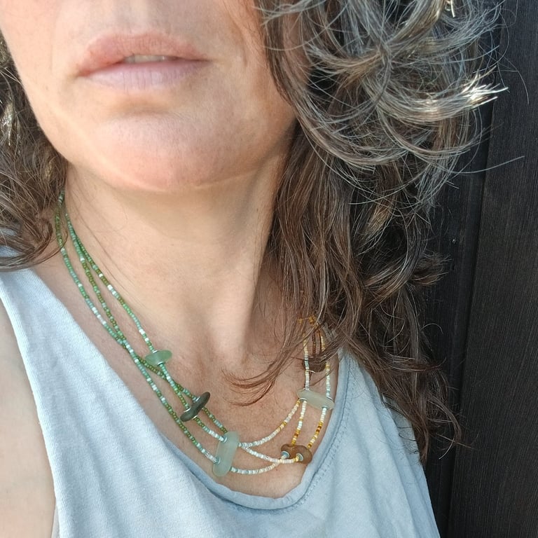 Multi-strand sea glass, silver and seed-bead necklace.
