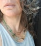 Multi-strand sea glass, silver and seed-bead necklace.