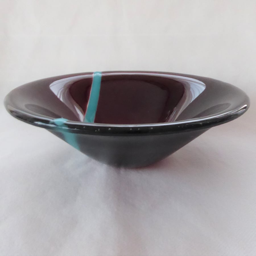 Deep plum fused glass bowl with turquoise stripe, 17cm round