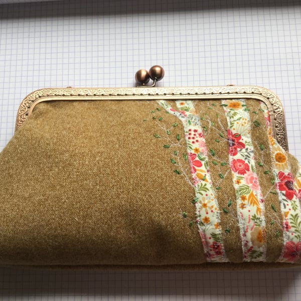 Clutch purse with floral tree detail