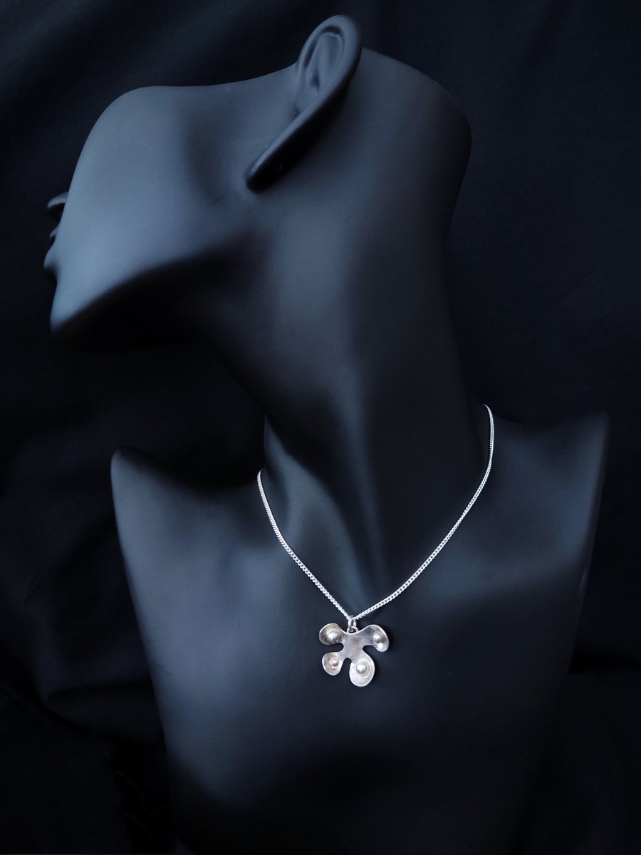 Silver abstract leaf pendant