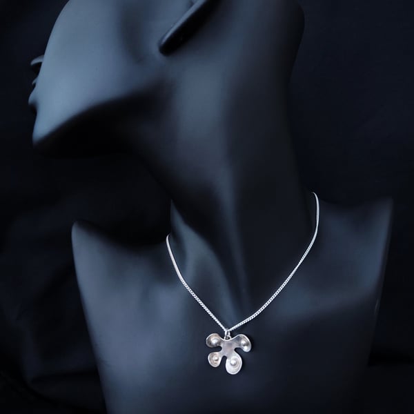 Silver abstract leaf pendant