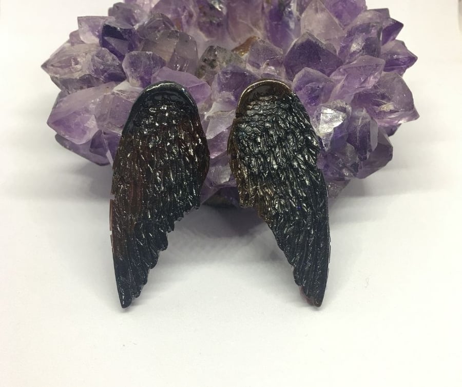 Black and dark red angel wing statement earrings on sterling silver.