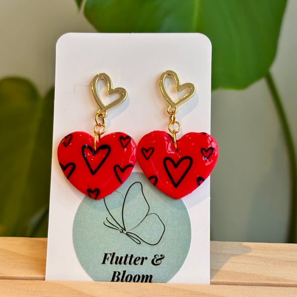 Red and gold love links dangling earrings 