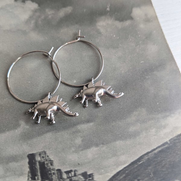 Petite Silver Stegosaurus charm earrings - little dinosaurs - hoops