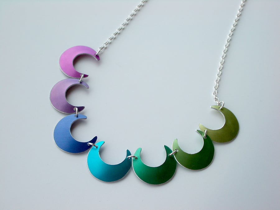 Crescent necklace in a spectrum of colours