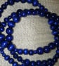 Haematite Crystal Ankh and Blue Polished Wooden African Beads Necklace - Image 2