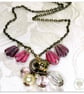 Handmade necklace with purple and white pearl glass beads with a gold heart - Image 2