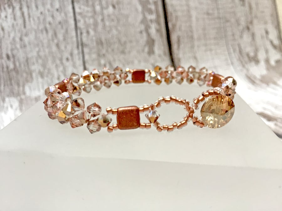 Crystal Bicone beaded bracelet in crystal Capri gold and copper tones