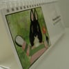 Calendar with prints of bunny rabbit pictures and paintings