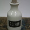 Small porcelain bottle with poison wording